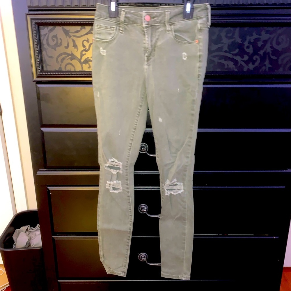Green skinny ripped jeans